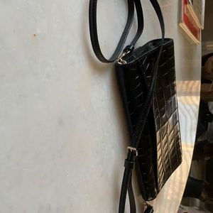 Coach clutch with strap